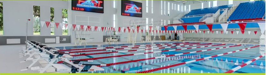 FAST natatorium with lane lines and spectator seating
